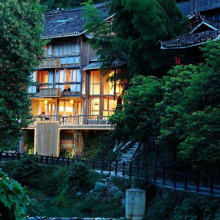 Tong Sang Art Hotel Liping Bagian luar foto