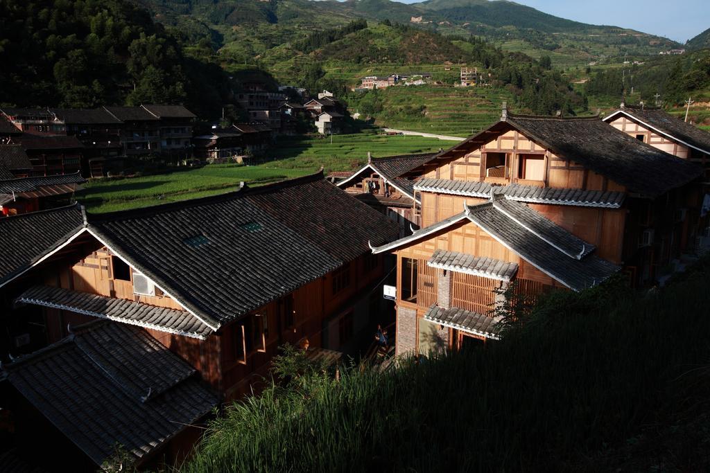 Tong Sang Art Hotel Liping Bagian luar foto