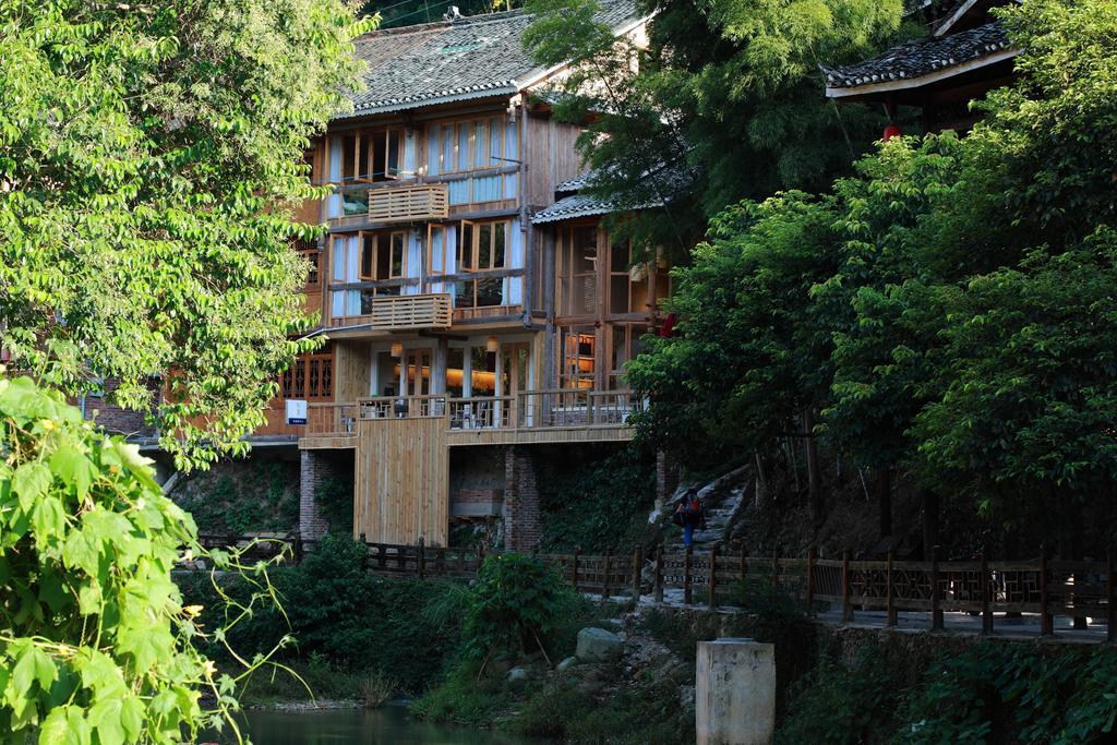 Tong Sang Art Hotel Liping Bagian luar foto