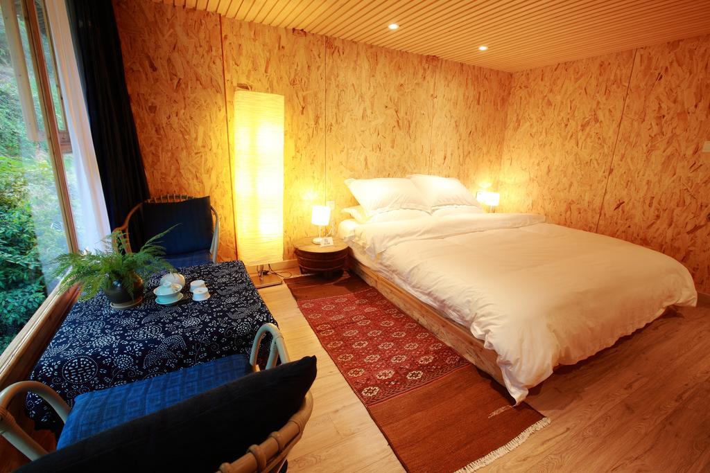 Tong Sang Art Hotel Liping Ruang foto