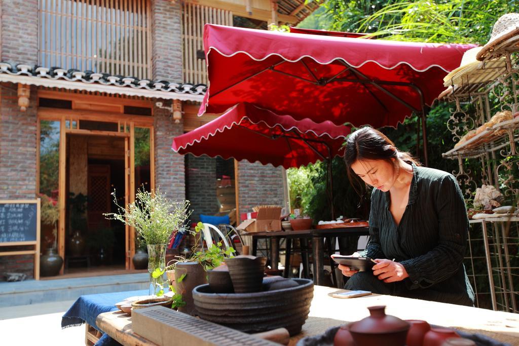 Tong Sang Art Hotel Liping Bagian luar foto