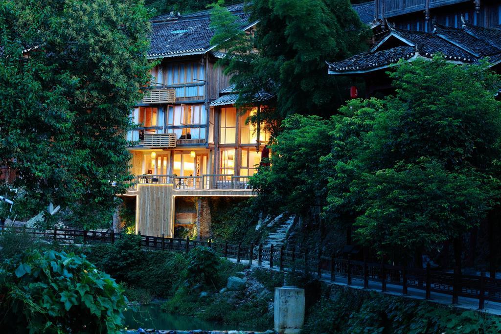 Tong Sang Art Hotel Liping Bagian luar foto
