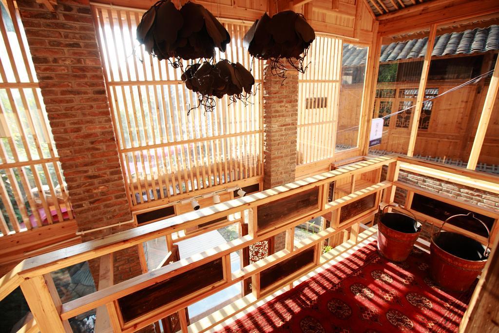 Tong Sang Art Hotel Liping Bagian luar foto