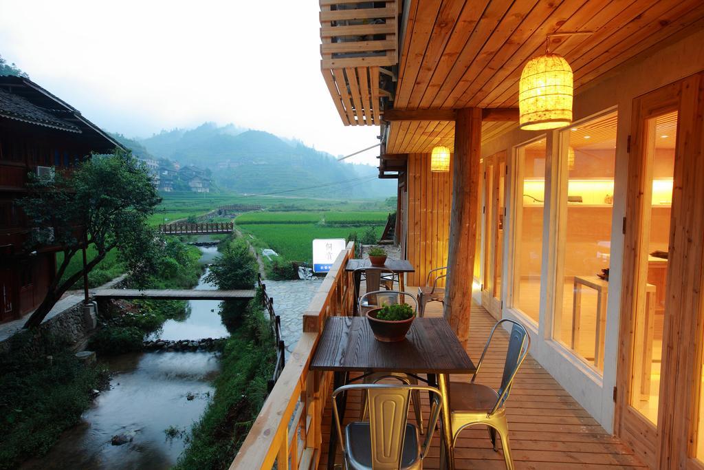 Tong Sang Art Hotel Liping Bagian luar foto