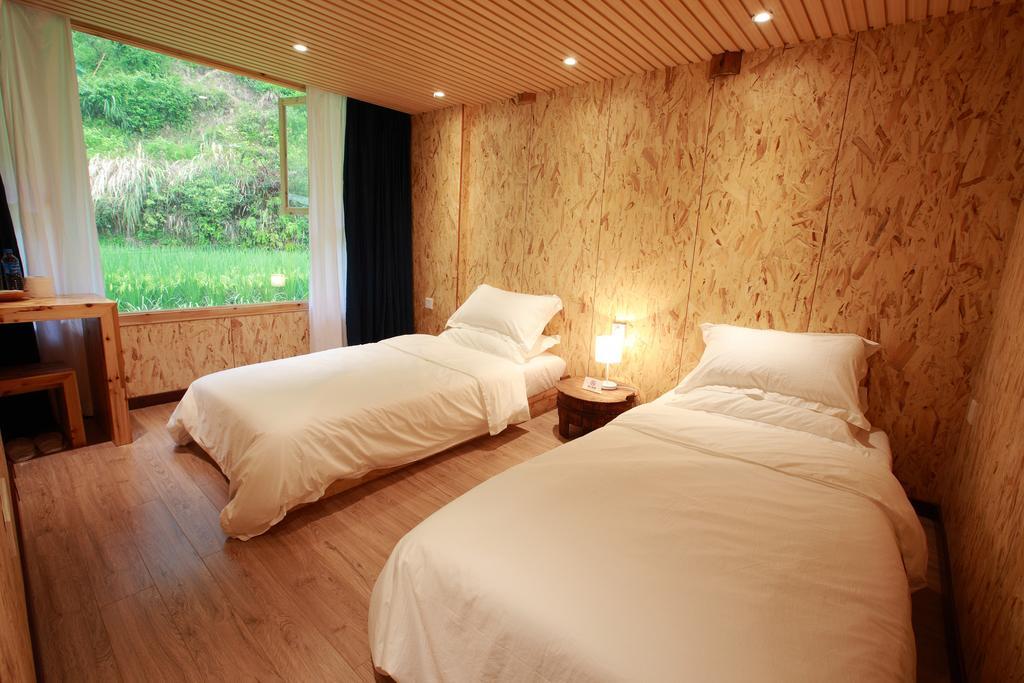 Tong Sang Art Hotel Liping Ruang foto