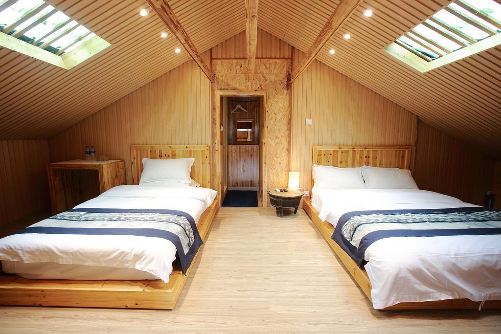 Tong Sang Art Hotel Liping Bagian luar foto