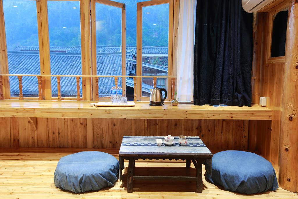 Tong Sang Art Hotel Liping Bagian luar foto