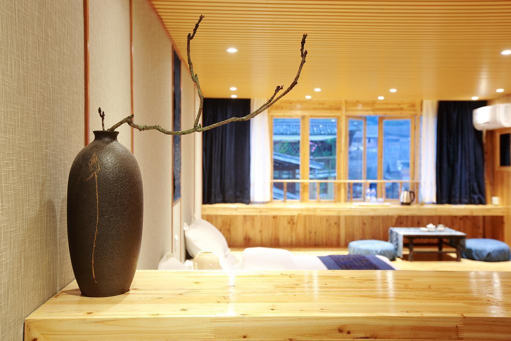 Tong Sang Art Hotel Liping Bagian luar foto