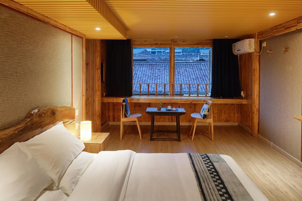 Tong Sang Art Hotel Liping Bagian luar foto
