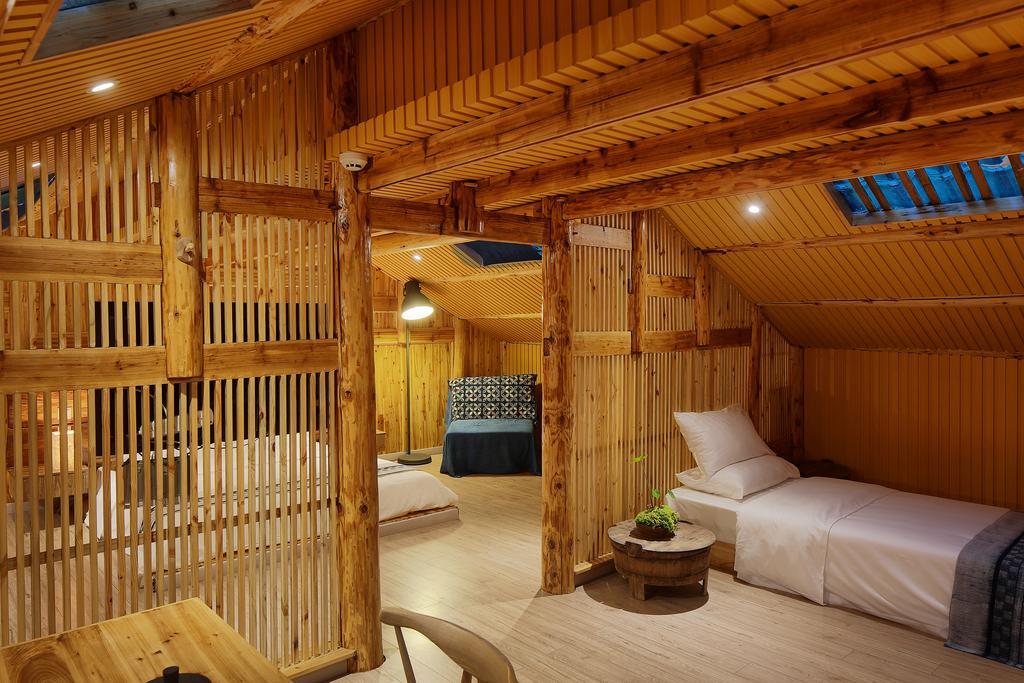 Tong Sang Art Hotel Liping Bagian luar foto
