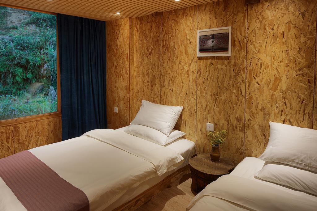 Tong Sang Art Hotel Liping Bagian luar foto