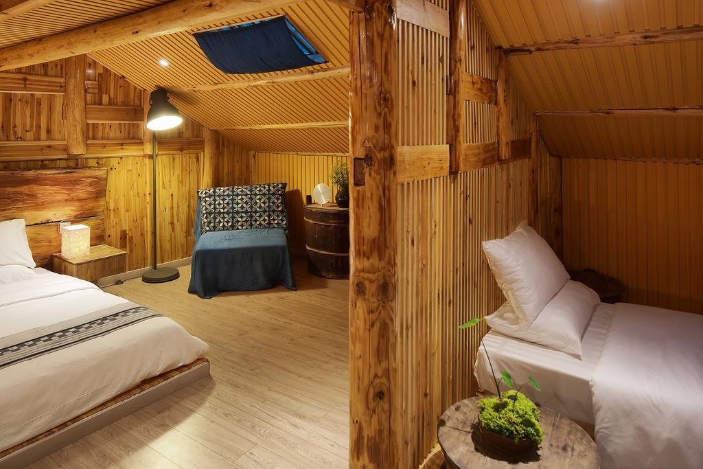 Tong Sang Art Hotel Liping Bagian luar foto