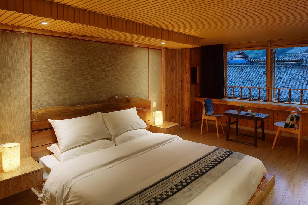 Tong Sang Art Hotel Liping Bagian luar foto