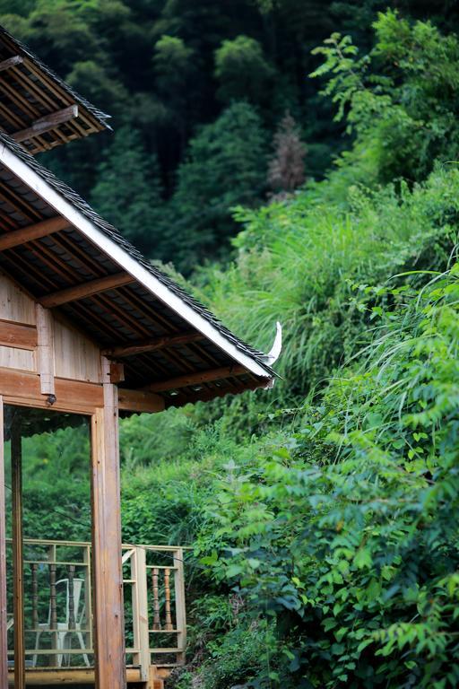 Tong Sang Art Hotel Liping Bagian luar foto