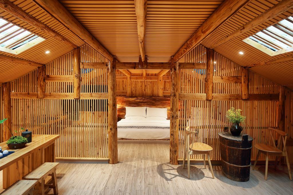 Tong Sang Art Hotel Liping Bagian luar foto
