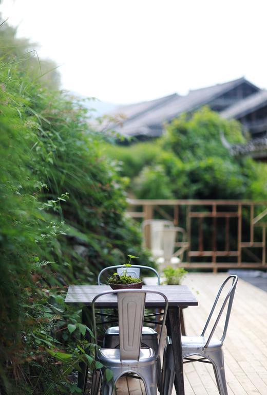Tong Sang Art Hotel Liping Bagian luar foto