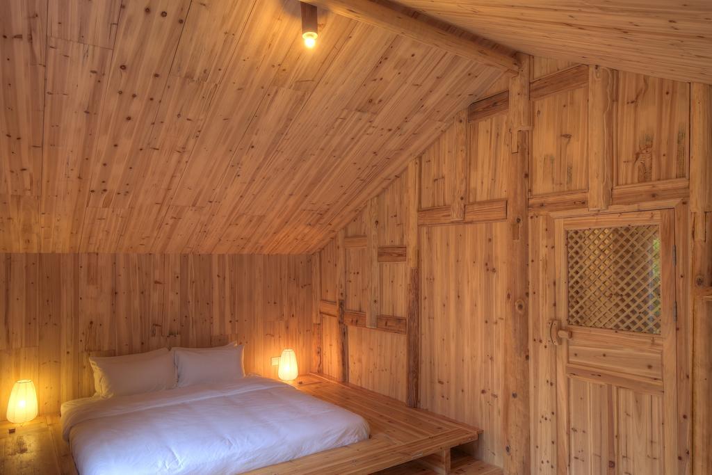 Tong Sang Art Hotel Liping Bagian luar foto