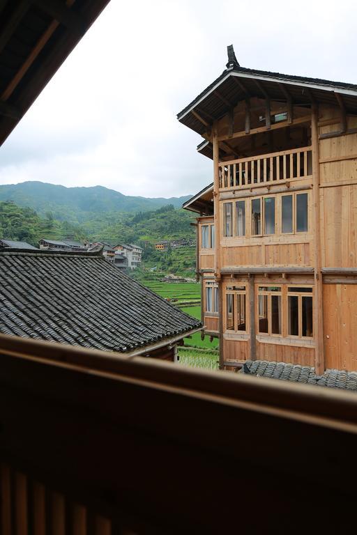 Tong Sang Art Hotel Liping Bagian luar foto